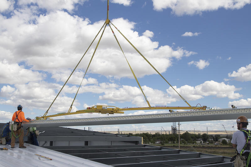 Our CladBoy in action installing roof panels.
