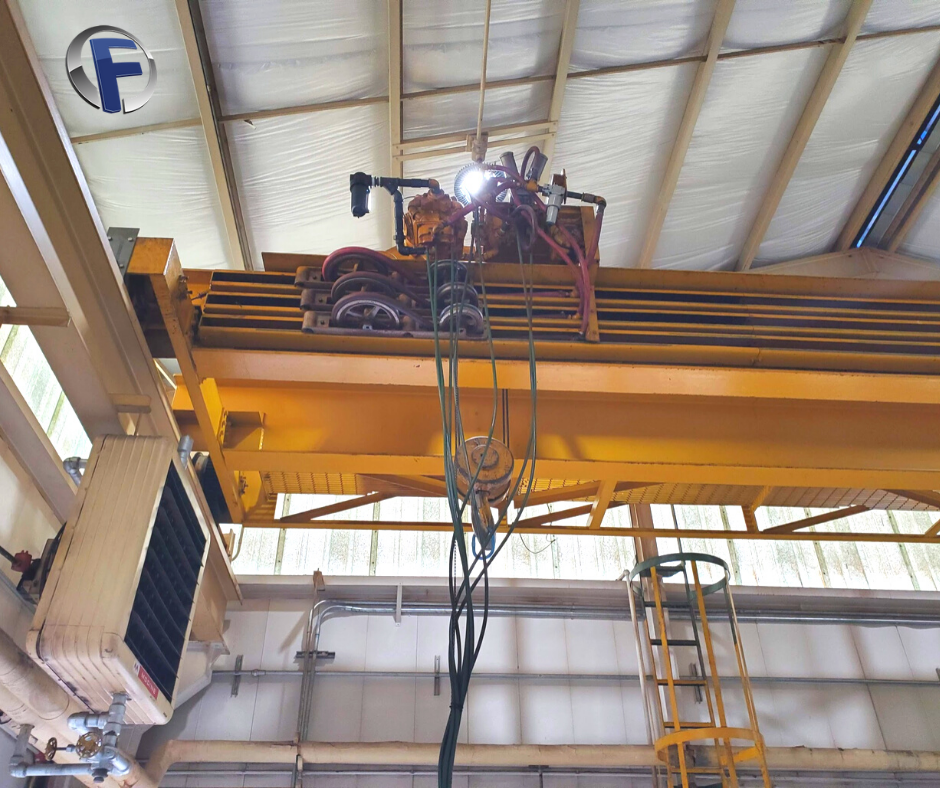 Swapping out the hoist in this overhead crane.